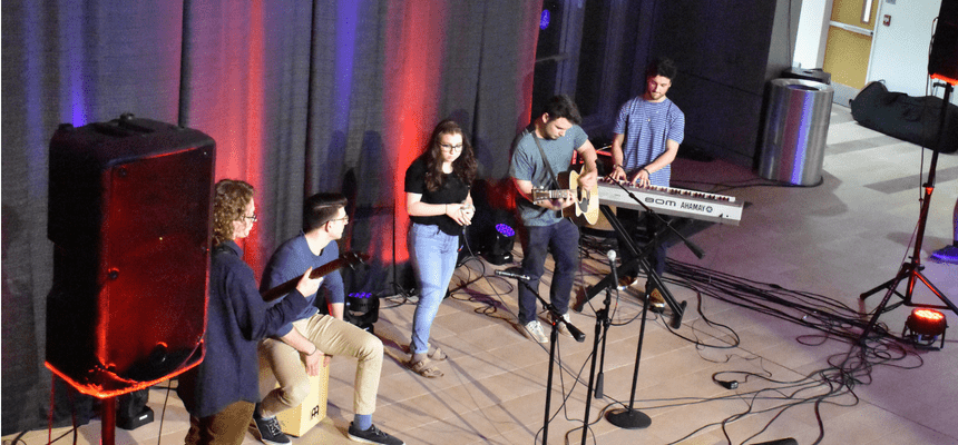 Student band performing in global heritage hall